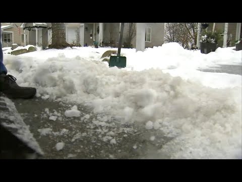 Chicago Weather: Residents dig out after winter storm leaves coating of ice, snow, slush on New Year