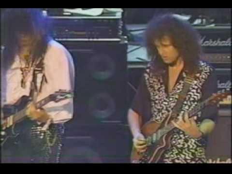 BRIAN MAY, GARY CHERONE, STEVE VAI & JOE SATRIANI -Now I'm Here