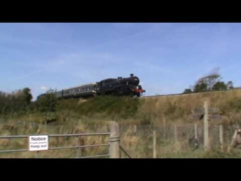 Two steam engines and a DMU on Swanage railway in Dorset UK.