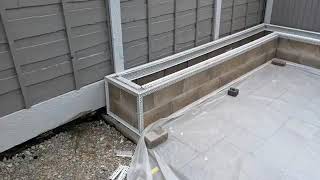 Album cover:  Rendering garden wall 