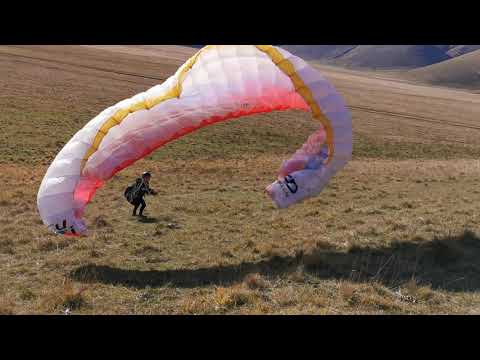 I love paragliding! 7 years old, Castelluccio Italy