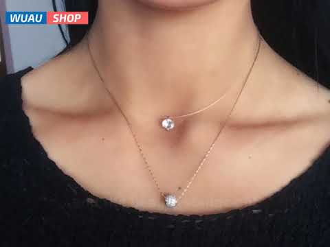 Transparent necklace with crystalline zircon pendant