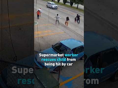 Supermarket worker rescues child from being hit by car