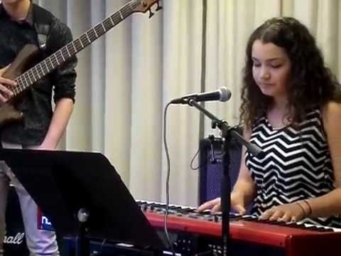 Amanda Puerto-Lichtenberg  on Piano & voice. 