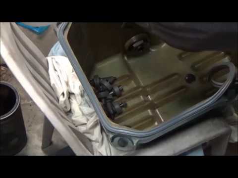 Detroit series 60 in frame rebuild (part 13) install oil pan and exhaust manifold