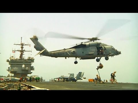 Helicopter Rappel Training On USS Enterprise