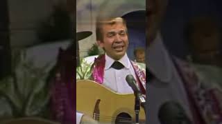 Buck Owens and the buckaroos doing a (Under the Influence of Love)