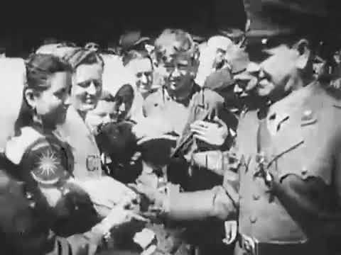 Croatian leader Ante Pavelic reviews troops and watches Black legion