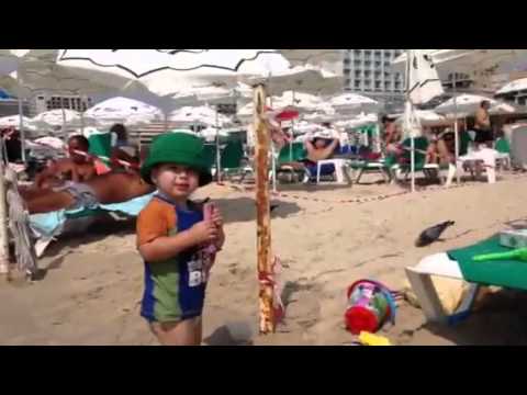 Yitzchak & Koby eating ice cream on the beach
