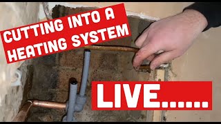 CUTTING INTO LIVE CENTRAL HEATING PIPES to fit RADIATOR without draining the system. Plumbing trick