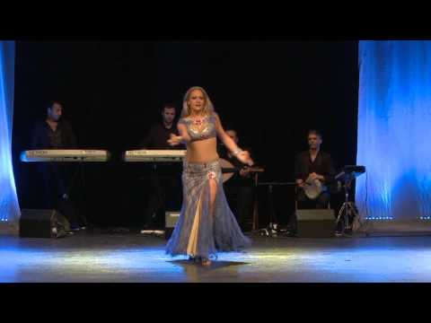 Leila performing with Khader Ahmad and live band RAKSA