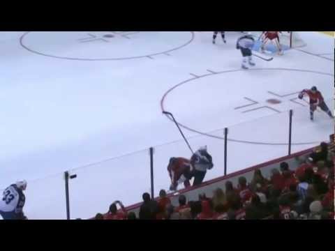 Troy Brouwer drills Olli Jokinen