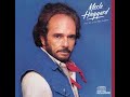 Let's Chase Each Other Around The Room de Merle Haggard