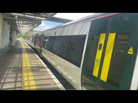 Southern leaving Horsham for Bognor Regis this train is formed of 4 coaches with the depot whistle