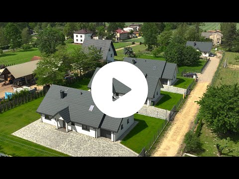 Dom Kamilek z dachem dwuspadowym i garażem