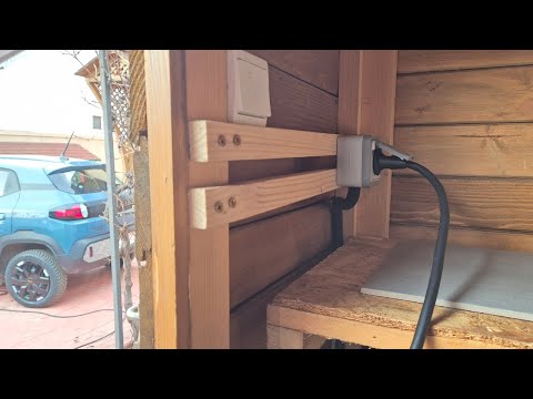 How do I charge the Dacia Spring (electric car) at home, from a normal outlet?