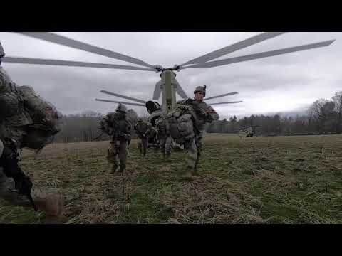 Soldiers from Bravo Company, 1-109th Infantry Regiment conduct aerial movement
