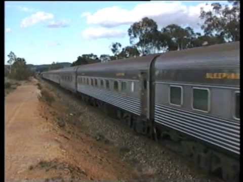 Australian steam locomotives - triple headed with two alco diesels shoving.