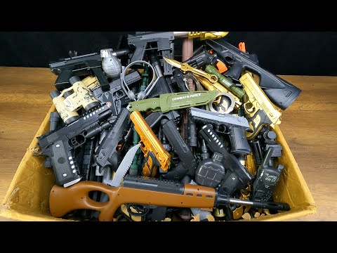 Box Of Black And Gold Color Toy Rifles And Guns, Realistic Toy Dangerous Weapons, With Bead Throwing