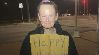 Trying to surviving flying a sign