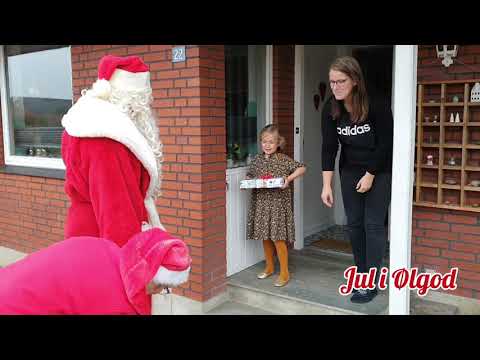 Julemanden tager ud med julegaver.