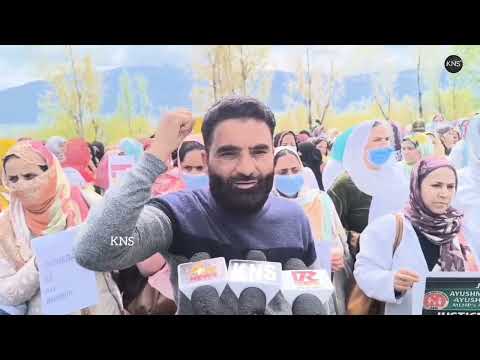 NHM employees hold a peaceful sit-in at District Hospital Kulgam, demanding their long-pending issues be addressed.