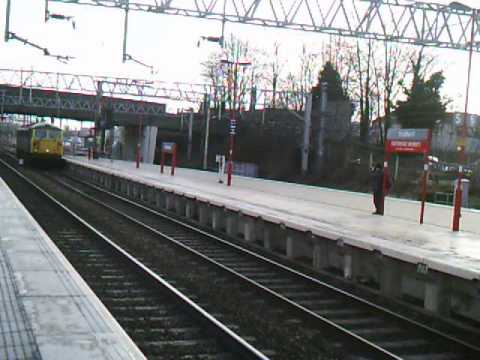 BR 87002 'Royal Sovereign' working 0Z87 Willesden TMD to Mossend Down Yard pass Stafford 24/1/15