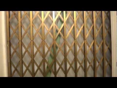 Vintage Gated General/Dover/Rotary hydraulic elevator with streetcar1743