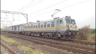 preview picture of video 'Late Running 04127 Allahabad - LTT AC Premium Spl takes a curve through Vasind'