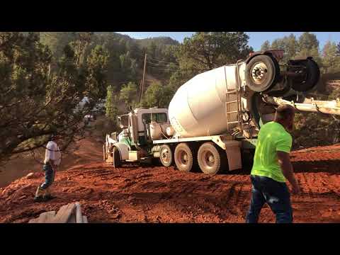 They made it, that's about 9-10 cubic yard of concrete around 18-20 Tons