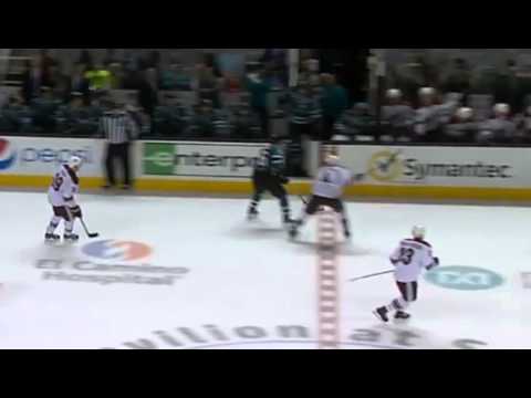 Zbynek Michalek checks Michal Handzus into the bench