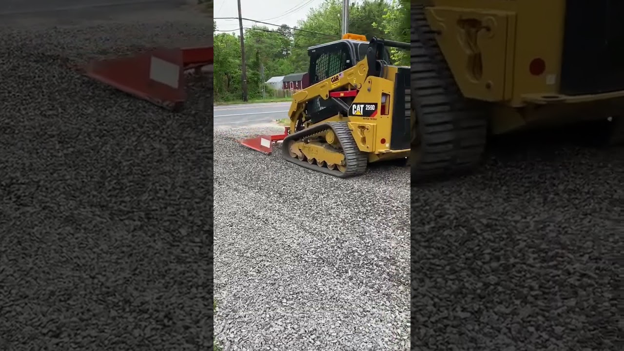 Cat259D with grader attachment