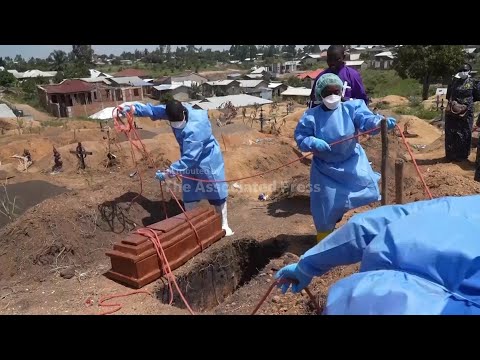 Red Cross workers bury six-month-old orphan who died of Ebola in DRCongo