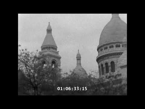 German soldier and woman at cafe in Paris (1940)