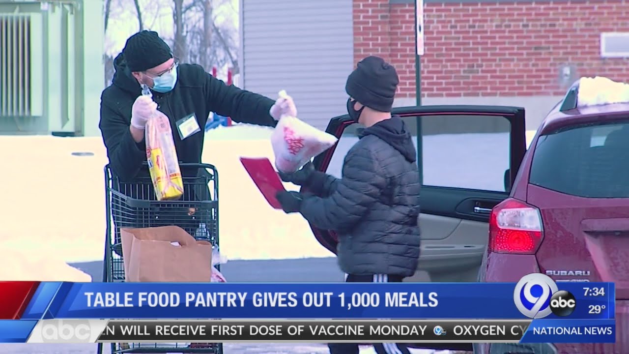 Table Food Pantry holiday food giveaway serves 1,000 in community