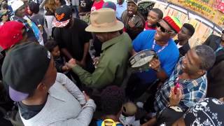 Spy Boy Ricky and other Mardi Gras Indians at the second line