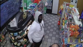 Newly released surveillance video shows suspect in armed carjacking