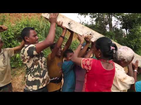 How to install an electricity pole – village style