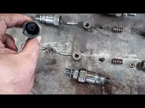 Mechanical diesel injector nozzle cleaning
