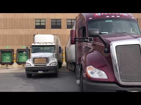 2-22-2019/082 coaching cdl student how to back into the docks on a 2 stop quad graphics load