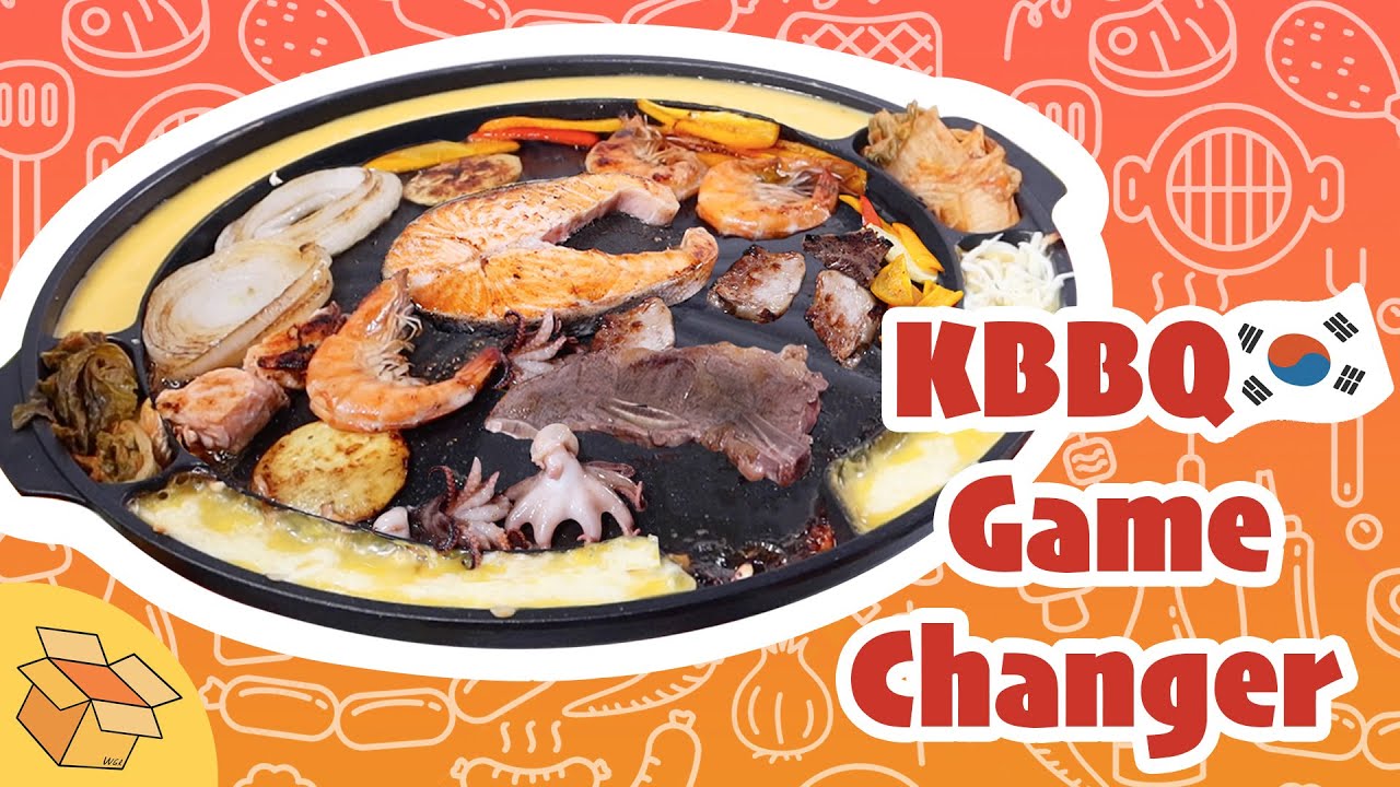A Korean BBQ grill pan on a kitchen stovetop with samgyeopsal pork belly slices grilling while the fat drains into the channeled edges