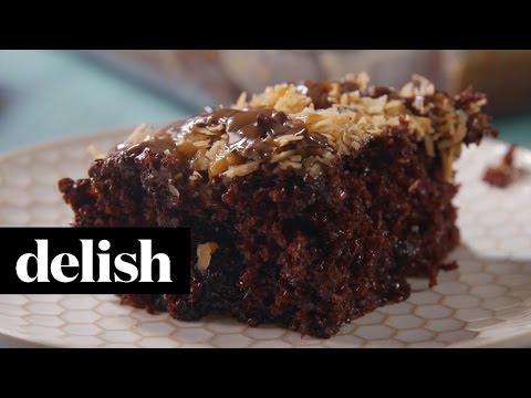 Samoa Poke Cake | Delish