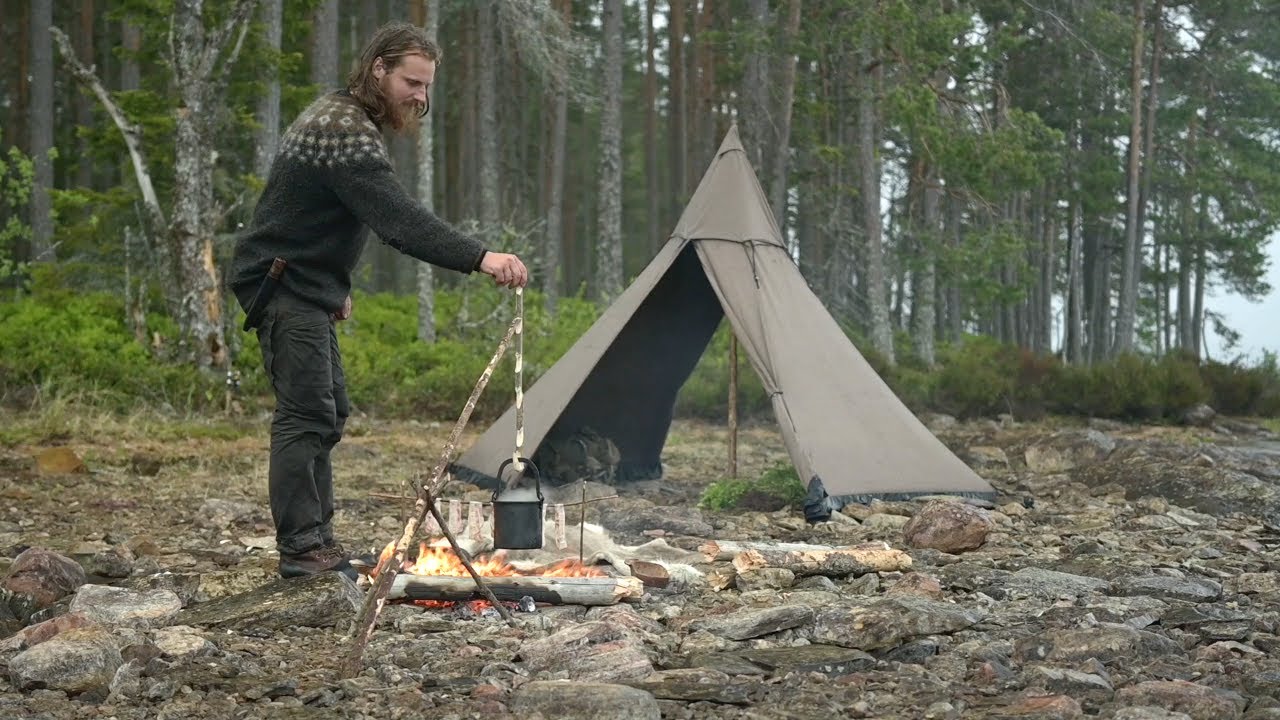 Solo bushcraft trip - canvas tent, 3 camps, rain, adjustable pot hangers, homemade knife etc.