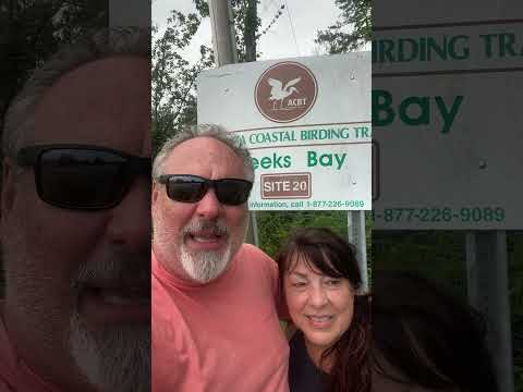 Chris and Velma at the beach, and you’re NOT! The Weeks Bay Bird and Walking Trail Observatory