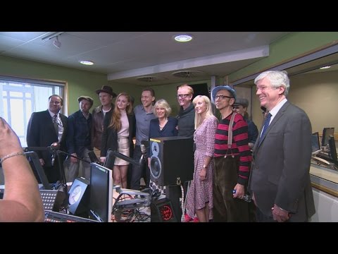 Tom Hiddlestone breaks protocol by putting arm around Camilla