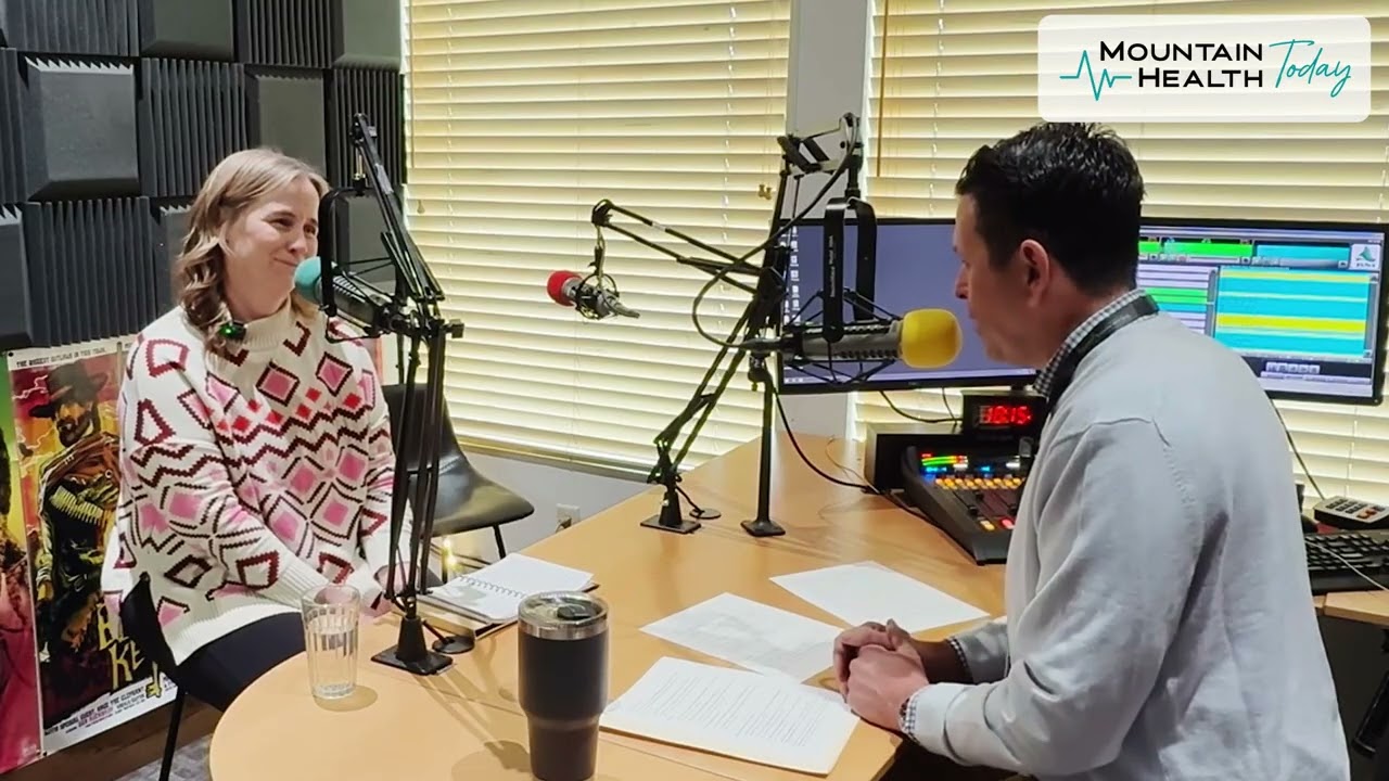 Dr. Brian Evans, Chief Medical Officer, and Dr. Kristy Howard of the Tahoe Forest Women’s Center speaking into microphones in the Mountain Health Today podcast studio