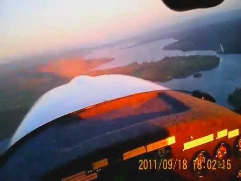 Ultralight flying at sunset