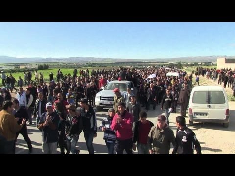 Thousands march in violence-hit Tunisian town