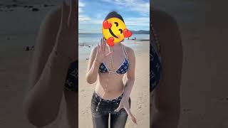 ボブカットの巨乳OLが夏のビーチでポージング！