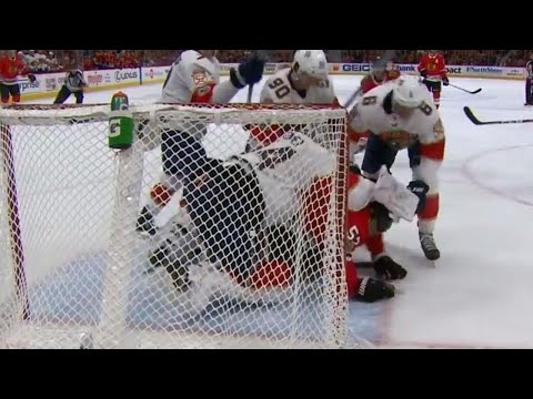 Reimer delivers a few blocker shots in fight as tempers flare between Panthers and Blackhawks